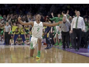 Oregon forward Louis King celebrates after scoring against UC Irvine during the second half of a second-round game in the NCAA men's college basketball tournament Sunday, March 24, 2019, in San Jose, Calif.