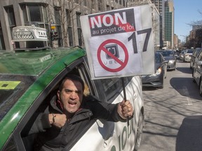 Taxi drivers take part in a one day strike to protest new government regulations in Montreal on Monday, March 25, 2019.