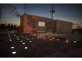 Modular pavement that features lighting, selective heating, and porous slabs designed to soak up water into a stormwater management system, are photographed during a media preview of Open Sidewalk - Winter Warmer in Toronto on Friday, March 1, 2019. The CEO of an Alphabet-backed entity planning for a high tech neighbourhood in Toronto says the company may pull out of the project if it can't get transit built in the neighbourhood.