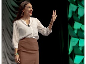 Rep. Alexandria Ocasio-Cortez, D-New York, waves to the audience during South by Southwest on Saturday, March 9, 2019, in Austin, Texas. Texas is an early primary state, but the real draw of the South by Southwest Festival in Austin for Democrats is face time with the party's ascendant young and liberal wing.