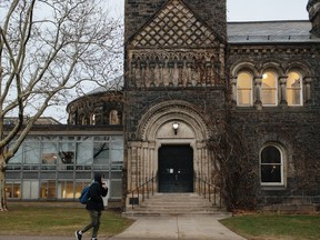 A student walks through the University of Toronto campus. Plagiarism at the university is said to be on the rise.