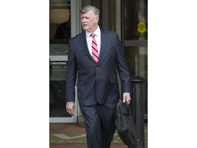 Attorney Kevin Downing arrives at the Federal Court for the sentencing of his client, former Trump campaign chairman Paul Manafort, in Alexandria, Va, Thursday, March 7, 2019. Manafort was convicted last year on five counts of filing false tax returns, two bank fraud charges, and one count of failing to report foreign bank accounts.