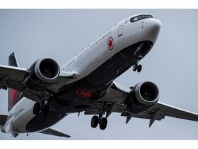 An Air Canada Boeing 737 Max aircraft arriving from Toronto prepares to land at Vancouver International Airport in Richmond, B.C., on Tuesday, March 12, 2019.