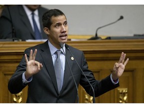 Venezuelan Congress President Juan Guaido, opposition leader who declared himself interim president, addresses the National Assembly in Caracas, Venezuela, Wednesday, March 6, 2019. The U.S. and more than 50 governments recognize Guaido as interim president, saying President Nicolas Maduro wasn't legitimately re-elected last year because opposition candidates weren't permitted to run.