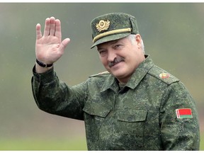 FILE - In this Wednesday, Sept. 20, 2017 file photo, Belarus' President Alexander Lukashenko waves to journalists as he arrives at the Zapad (West) 2017 joint Russia-Belarus military exercises at the Borisovsky range in Borisov, Belarus. The president of Belarus, who was once dubbed Europe's last dictator, said on Tuesday March 5, 2019 that he is eager for better ties with NATO in the light of talks about the price Russia charges to sell his country oil.