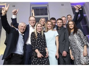 Supporters of the Reform Party leading by Kaja Kallas, center, react at their headquarters after parliamentary elections in Tallinn, Estonia, early Monday, March 4, 2019. The rival Reform and Center parties, the two main political groupings since Estonia regained independence amid the collapse of the Soviet Union in 1991, shared an election goal of keeping EKRE from making inroads.