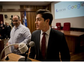 Google's head of Cuba operations, Brett Perlmutter speaks to the press accompanied by Luis Adolfo Iglesias Reyes, vice president of investments of Etecsa, in Havana, Cuba, Thursday, March 28, 2019. The American internet giant and the Cuban government agreed Thursday morning to create a seamless, cost-free connection between their two networks once Cuba is able to physically connect to a new undersea fiber-optic cable.