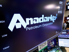 The logo for Anadarko Petroleum Corp. appears above a trading post on the floor of the New York Stock Exchange. Anadarko has agreed to negotiate with Occidental on a competing offer to Chevron.