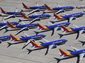 Southwest Airlines Boeing 737 MAX aircraft are parked on the tarmac after being grounded in California.