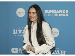 FILE - In this Tuesday, Jan. 29, 2019 file photo, actress Demi Moore poses at the premiere of the film "Corporate Animals" during the 2019 Sundance Film Festival, in Park City, Utah. Nine years after her book deal was first announced, Moore is ready to release a memoir her publisher calls "deeply candid and insightful." Moore's "Inside Out" is scheduled for September 24, HarperCollins announced Wednesday, April 17, 2019.