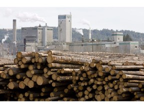 Logs are piled up at West Fraser Timber in Quesnel, B.C., Tuesday, April 21, 2009.