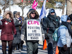 Support workers from CUPE 2424 walk the picket line at Carleton University on March 19, 2018.