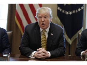 President Donald Trump speaks during the White House Opportunity and Revitalization Council meeting in the Cabinet Room of the White House, Thursday, April 4, 2019, in Washington.