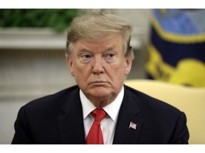 President Donald Trump listens as he meets with NATO Secretary General Jens Stoltenberg in the Oval Office of the White House, Tuesday, April 2, 2019, in Washington.