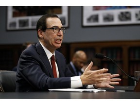 Treasury Secretary Steven Mnuchin testifies before a House Appropriations subcommittee, Tuesday, April 9, 2019, on Capitol Hill in Washington. Mnuchin said Tuesday that his department intends to "follow the law" and is reviewing a request by a top House Democrat to provide President Donald Trump's tax returns to lawmakers.