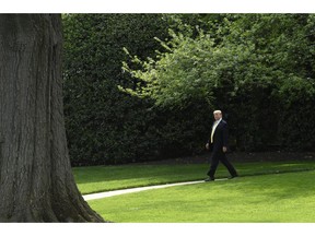 President Donald Trump walks out of the Oval Office as goes to speak on the South Lawn of the White House in Washington, Thursday, April 25, 2019, as part of the activities for Take Our Daughters and Sons to Work Day at the White House.