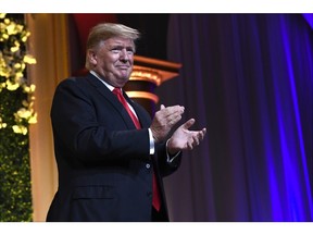 President Donald Trump arrives to speak at the National Republican Congressional Committee's annual spring dinner in Washington, April 2, 2019.