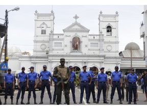 Sri Lankan Army soldiers secure the area around St. Anthony's Shrine after a blast in Colombo, Sri Lanka, Sunday, April 21, 2019. A Sri Lanka hospital spokesman says several blasts on Easter Sunday have killed dozens of people.