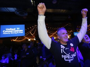 Alberta United Conservative supporters cheer on leader Jason Kenney on election night at Big Four Roadhouse on the Stampede grounds in Calgary on Tuesday, April 16, 2019.