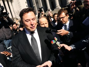 Tesla CEO Elon Musk exits federal court after attending a hearing on April 4 in New York City.