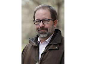 Keir Giles, a Russia specialist with Britain's Chatham House think tank, poses for a photo in central London on Thursday, Feb. 28, 2019. Giles was one of three people targeted by an undercover agent calling himself Lucas Lambert. An Associated Press investigation has found that the operation appears to have been directed at critics of the Russian antivirus firm Kaspersky Lab.