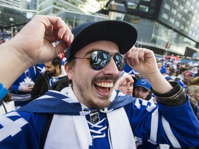 Toronto Maple Leafs fan Chris Gauthier waits for the game to start outside of the Air Canada Canada at Maple Leaf Square in Toronto, Ont.