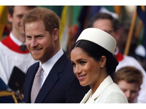 FILE - In this Monday, March 11, 2019 file photo, Britain's Prince Harry and Meghan, the Duchess of Sussex leave after the Commonwealth Service at Westminster Abbey in London. Guinness World Records said Wednesday, April 3 that a new Instagram account opened by Prince Harry and his wife Meghan is the fastest-ever to gain 1 million followers.  The account, which was opened Tuesday, reached the 1 million mark in under six hours, easily beating a record held by Korean pop sensation Kang Daniel.