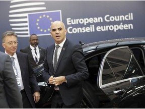 FILE - In this Friday, Oct. 19, 2018 file photo, Switzerland's President Alain Berset arrives for an EU-ASEM summit in Brussels. Britons wondering what life may be like outside the European Union might consider how the Swiss, Turks or Norwegians have fared: They know well the benefits and headaches of being close to - but not part of - the gargantuan economic and political bloc.