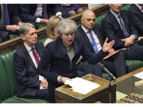 In this photo provided by the UK Parliament, Britain's Prime Minister Theresa May addresses MP's in the Palace of Westminster in London, Wednesday, April 3, 2019. A Brexit-related vote in Britain's House of Commons on Wednesday ended in a tie, the first time that has happened in a quarter-century. Under Parliament's rules, the speaker of the House has tie-breaking power. Speaker John Bercow cast his vote with the noes. He said that was in keeping with the principle that "it is not for the chair to create a majority that otherwise doesn't exist."