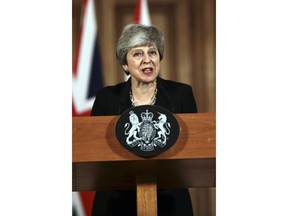 Britain's Prime Minister Theresa May gives a press conference outside Downing Street, in London, Tuesday, April 2, 2019. May said Tuesday that she will seek to further delay Britain's exit from the European Union and seek to make an accord with the political opposition in a bid to break the Brexit impasse. May made the announcement after the EU's chief negotiator warned that a chaotic and costly Brexit was likely in just 10 days unless Britain snapped out of the political crisis that has paralyzed the government and Parliament.