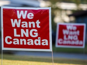 Signs reading "We Want LNG Canada" stand in Kitimat, British Columbia.