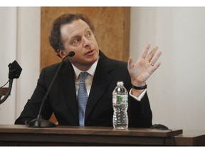 FILE - In this March 10, 2014, file photo, James Cohen, speaks from the witness stand in Hackensack, N.J. The National Enquirer is being sold to Cohen, the former head of the airport newsstand company Hudson News. The deal comes after a rocky year for the tabloid in which it was caught up in a federal probe of illegal campaign contributions to Donald Trump's presidential campaign in 2016.