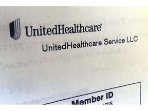 FILE - In this June 15, 2018 file photo, United Healthcare correspondence is seen in North Andover, Mass. UnitedHealth Group is reporting strong first-quarter driven by its main insurance business, as well as its pharmacy benefits division.  The Minnetonka, Minn., company on Tuesday, April 16, 2019 reported net income of $3.47 billion, or $3.56 per share. Earnings, adjusted for amortization costs, were $3.73 per share, topping Wall Street estimates by 13 cents, according to a survey by Zacks Investment Research.