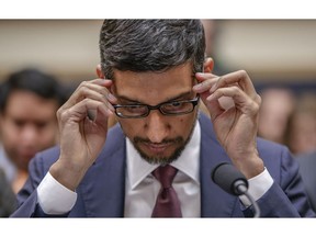 FILE- In this Dec. 11, 2018, file photo Google CEO Sundar Pichai appears before the House Judiciary Committee to be questioned about the company's privacy security and data collection, on Capitol Hill in Washington. Support for a privacy law is part of a broader effort by regulators and lawmakers to lessen the domination of companies like Facebook, Google and Amazon. Some, including Sen. Elizabeth Warren, a Democratic presidential candidate, have called for the tech giants to be split up.