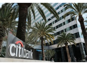 FILE- This March 23, 2018, file photo shows the entrance to Citibank at the Citigroup Center in downtown Los Angeles. Citigroup reports earnings Monday, April 15, 2019.