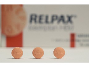 In this Friday, April 26, 2019 photo, a box of RELPAX migraine pills manufactured by Pfizer are arranged for a photo in Doral, Fla. Pfizer Inc. reports financial results Tuesday, April 30.