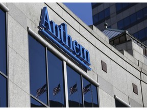 FILE - In this Feb. 5, 2015, file photo, the Anthem logo hangs at the health insurer's corporate headquarters in Indianapolis. Anthem Inc., reports earnings Wednesday, April 24, 2019.