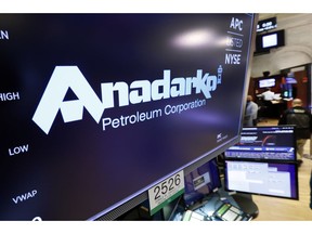 FILE - In this April 12, 2019, file photo the logo for Anadarko Petroleum Corp. appears above a trading post on the floor of the New York Stock Exchange. Anadarko plans to restart takeover talks with Occidental, less than a week after Occidental made a competing bid to Chevron's deal. Anadarko Petroleum Corp. said Monday, April 29 that it's resuming talks with Occidental because its board determined Occidental's offer could possibly be a superior proposal to the Chevron transaction.