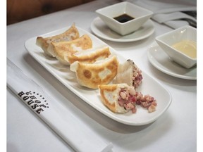 This undated photo provided by Stratis Morfogenin April 2019 shows the pastrami dumplings at Brooklyn Chop House in New York City. Morfogen, who is of Greek descent, doesn't spend time worrying about the cultural appropriation accusations his steakhouse has received for its Chinese-inspired items.