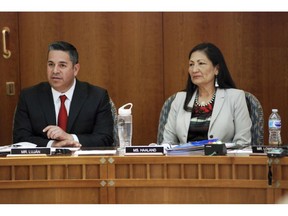 U.S. Reps. Ben Ray Luján, left, and Debra Haaland of New Mexico speak at a field hearing of a House Subcommittee on Energy and Mineral Resources in Santa Fe, N.M., on Monday, April 15, 2019, about the affects of air pollution on sacred Native American cultural sites. Leaders of the Navajo Nation and Pueblo tribes expressed frustration at the hearing with federal oversight of oil and gas leases on public holdings near ancient Native American cultural sites and endorsed legislation to restrict natural gas development around Chaco Culture National Historic Park. New Mexico's all-Democratic House delegation is seeking to halt new oil and natural gas lease sales on federal holdings within a 10-mile (16-kilometer) buffer zone around Chaco Culture National Historic Park.