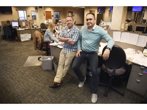 In this April 9, 2019, photo, Argus Leader investigative reporter Jonathan Ellis and news director Cory Myers in the newsroom in Sioux Falls, S.D. In 2010, reporters at South Dakota's Argus Leader newspaper came up with the idea of requesting data about the government's food assistance program. They thought the information about the $65-billion dollar-a year program, previously known as food stamps, could lead to a series of stories and help them identify possible fraud. But the government didn't provide everything the paper wanted. Trying to get the data has taken the paper more than eight years and landed the case at the Supreme Court.