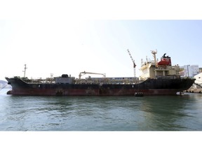 South Korean fishing boat P-PIONEER is seen a port in Busan, South Korea, Wednesday, April 3, 2019. Officials say a South Korean ship is being held at a domestic port over suspicions that it illegally provided oil to heavily sanctioned North Korea.