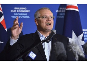 Australian Prime Minister Scott Morrison speaks at a business breakfast in Darwin, Wednesday, April 24, 2019. Morrison and his political rival, Bill Shorten, say they are not tailoring their political messages to suit Chinese censors as the politicians increasingly use Chinese social media to woo Chinese-speaking voters.