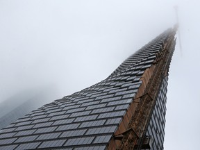 The under construction Telus Sky building twists into a misty morning in Calgary on Monday March 25, 2019.