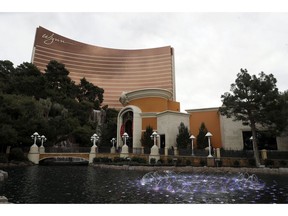 FILE - This Feb. 19, 2018, file photo, shows Wynn Las Vegas in Las Vegas. Las Vegas casino giant Wynn Resorts is in talks to buy Australia's largest casino operator, Crown Resorts. Crown, which owns casinos in Melbourne, Perth and London and will soon open another in Sydney, confirmed in a statement on Tuesday, April 9, 2019 it was in confidential takeover discussions over a cash-and-scrip offer from Wynn.