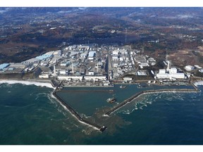 FILE - This Nov. 22, 2016, aerial file photo shows Fukushima Dai-ichi nuclear power plant in Okuma, Fukushima prefecture, Japan. The World Trade Organization has upheld South Korea's import ban on Japanese seafood from areas affected by the 2011 nuclear disaster in Fukushima. South Korea on Friday, April 12, 2019, welcomed the decision and said it will continue to block all fishery products from Fukushima and seven neighboring prefectures to ensure "only foods that are confirmed as safe are put on the table."(Kyodo News via AP, File)