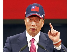 FILE - In this Feb. 2, 2019, file photo, Terry Gou, chairman of Hon Hai Precision Industry Co. Ltd., also known as Foxconn, delivers a speech during the company's annual carnival for employees in Taipei, Taiwan. Gou, head of Foxconn, world's largest electronics supplier, says Wednesday, April 17, 2019, willing to run in Taiwan presidential primary Wednesday, April 17, 2019.