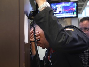 A trader on the floor of the New York Stock Exchange.