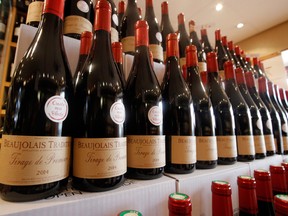Beaujolais Nouveau wine are displayed in a wine store at Issy Les Moulineaux, outskirts of Paris.