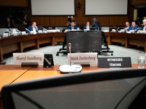 Seats marked for Facebook's Mark Zuckerberg and Sheryl Sandberg remained empty at the hearings.
